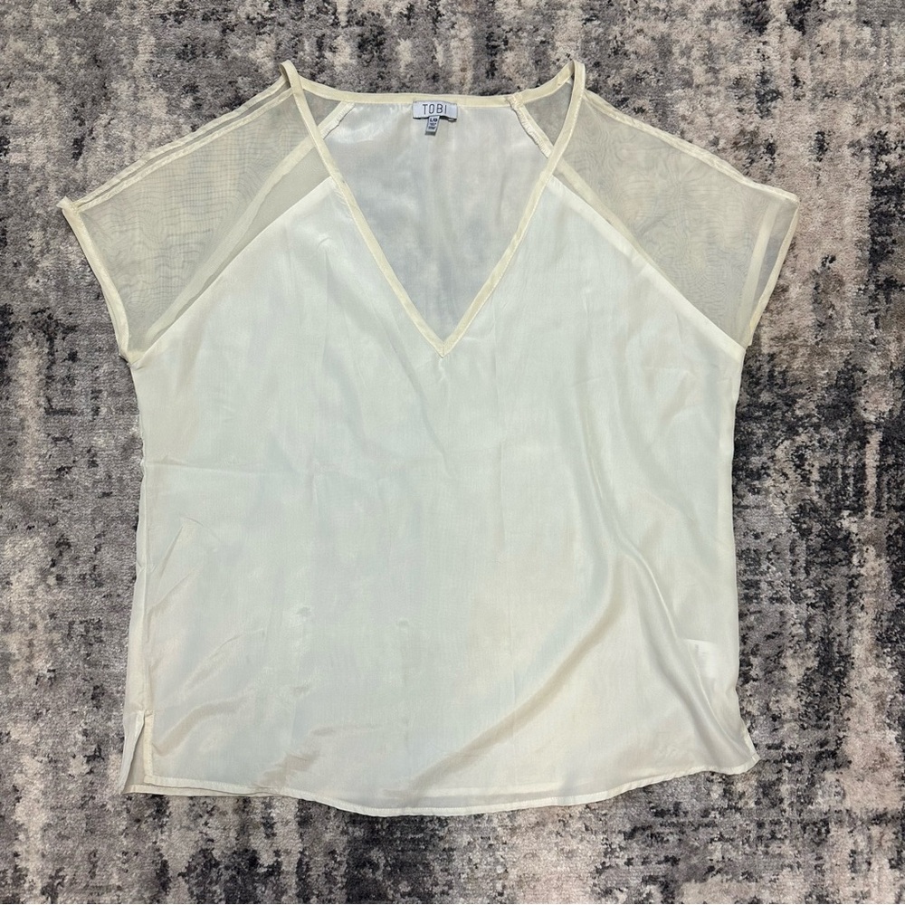 Tobi “cold shoulder” top